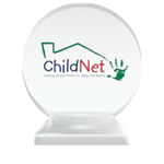 The ChildNet professional logo printed on a round crystal trophy to represent their charter membership status with the National Center for Community-Based Child Welfare. 