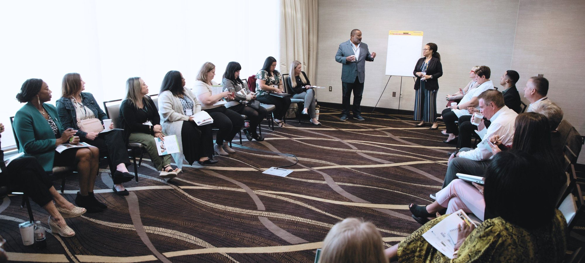 Members, Leaders, and Partners of the National Center for Community-Based Child Welfare gathered for a group picture at the annual symposium. 